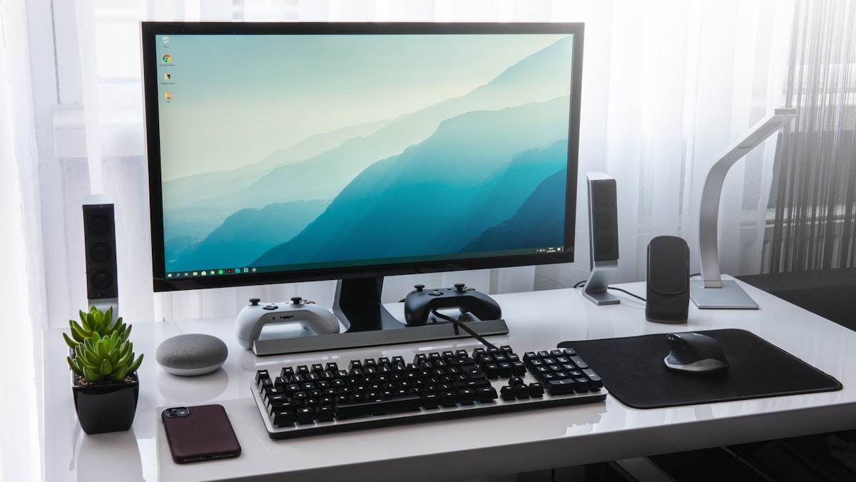 macOS Tahoe 26.3のシステム設定 — アクセシビリティとアップデートオプションを表示